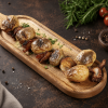 Картофель бейби на мангале с салом